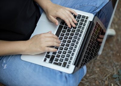 a woman working with laptop